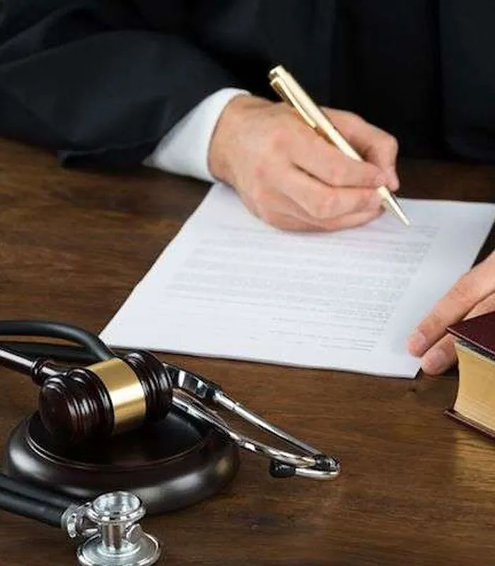Medical expert team discussing clinical findings to substantiate medical malpractice liability and causation